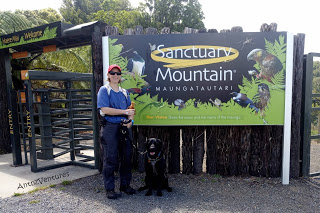 Antnz (left) and ADNZ Ben in front of the sign at Maungatautari Sanctuary