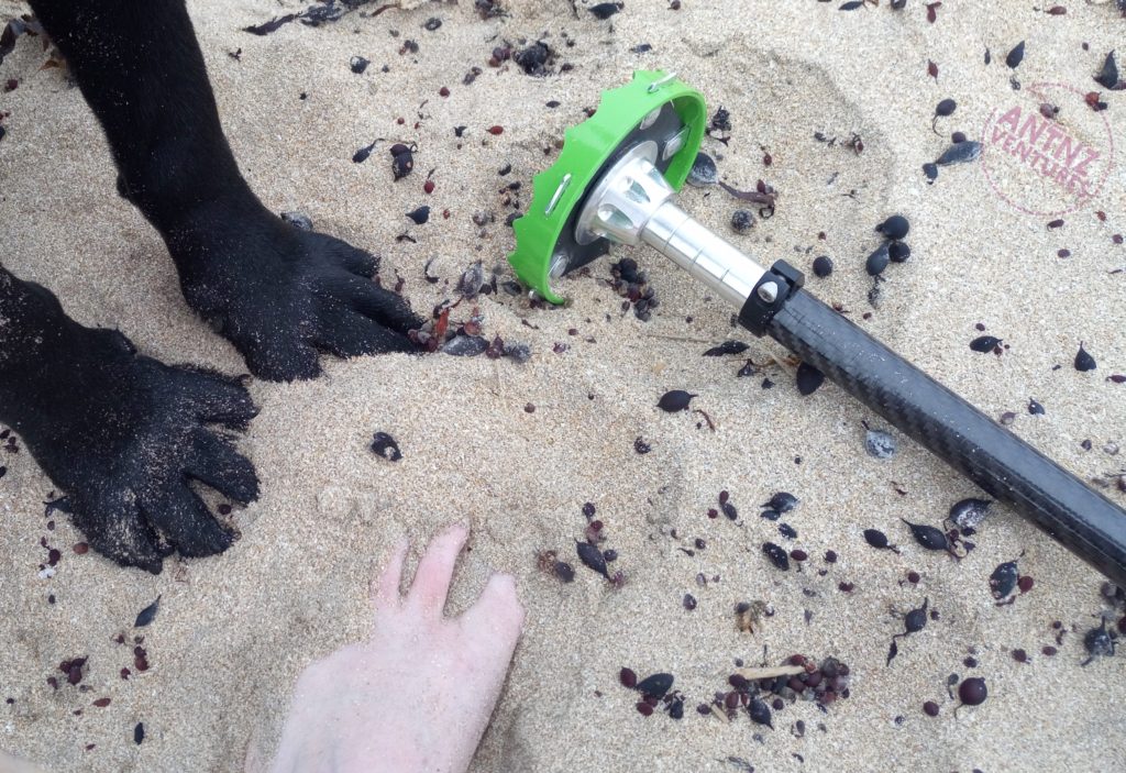 ADNZ Ben's front paws (left), Antnz left foot (middle) and SideStix Sand Shoe on white sand