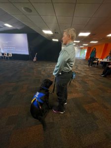 Antnz standing with ADNZ Raven sitting at her feet.